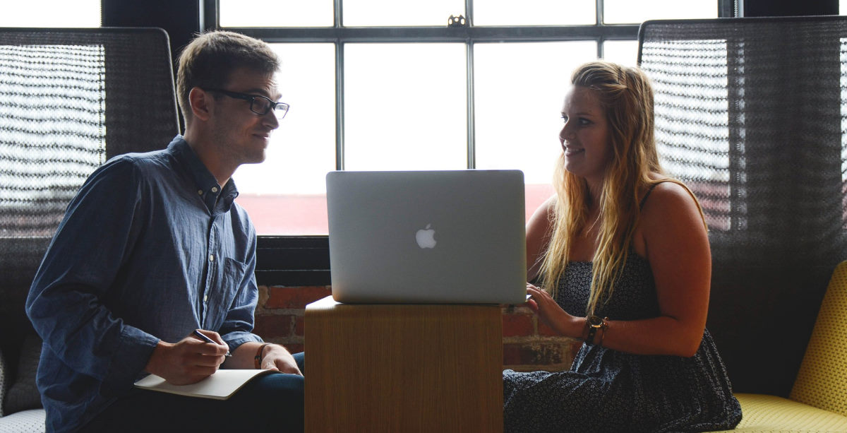 two business people meeting with laptop