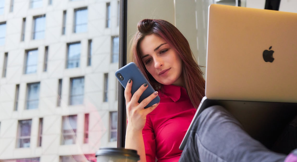 Gen Z woman looking at phone