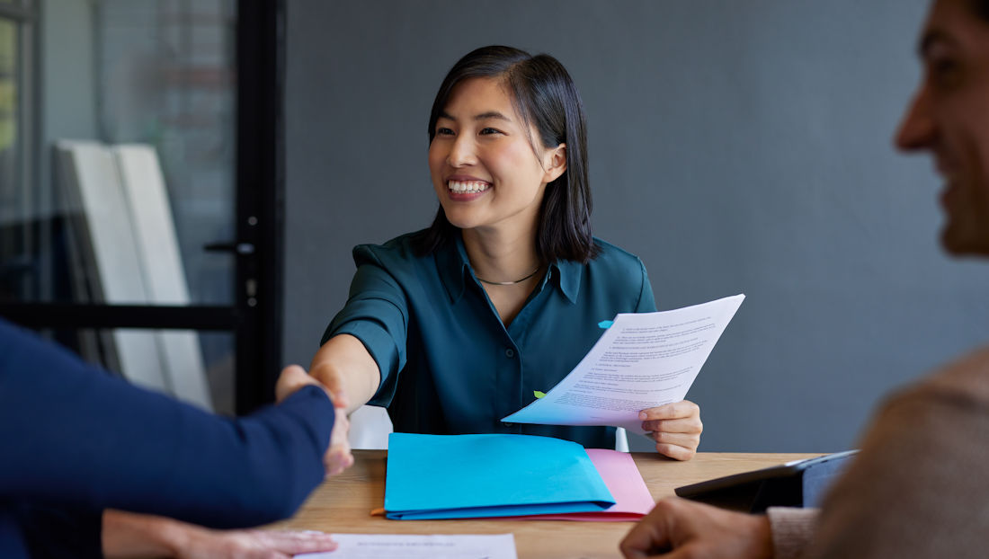 hiring manager shaking hands