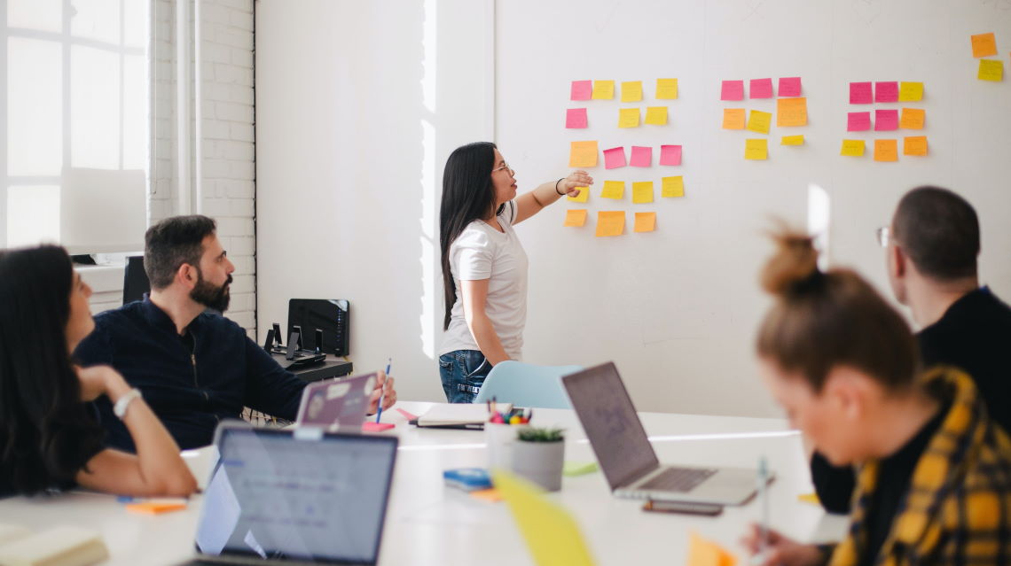 leading a meeting with sticky notes